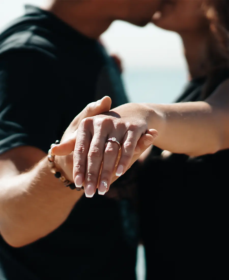 Engaged Couple Kissing